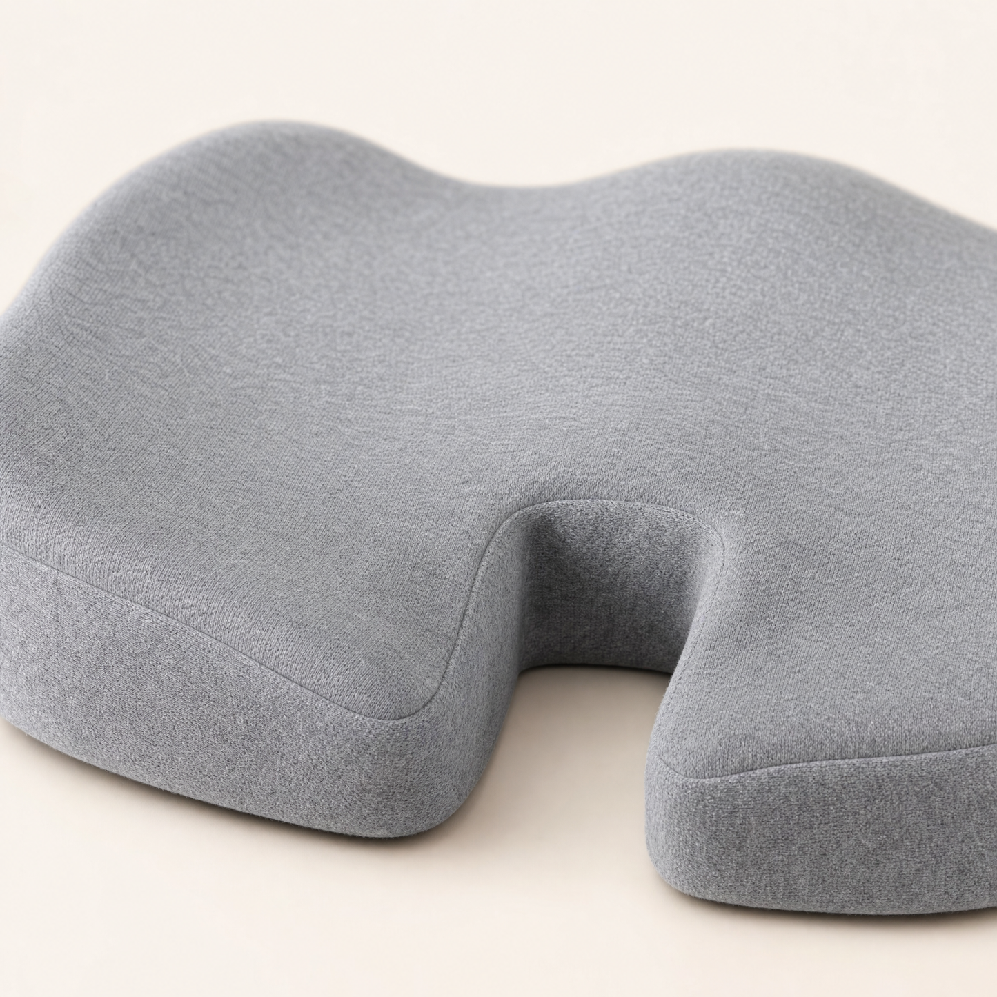 Close detail of the coccyx relief channel on the VESU Orthopedic Seat Cushion