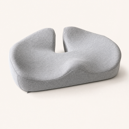 VESU Orthopedic Seat Cushion in light grey, showing the U-shaped coccyx relief cut-out at the rear